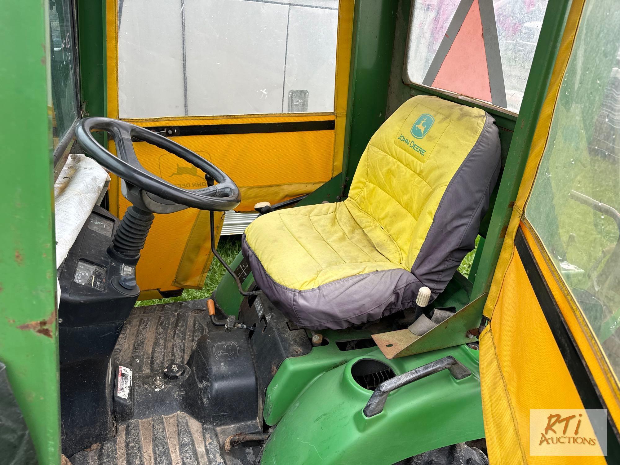 John Deere 2210 4WD compact diesel tractor with loader, backhoe, cab, 1333 hrs