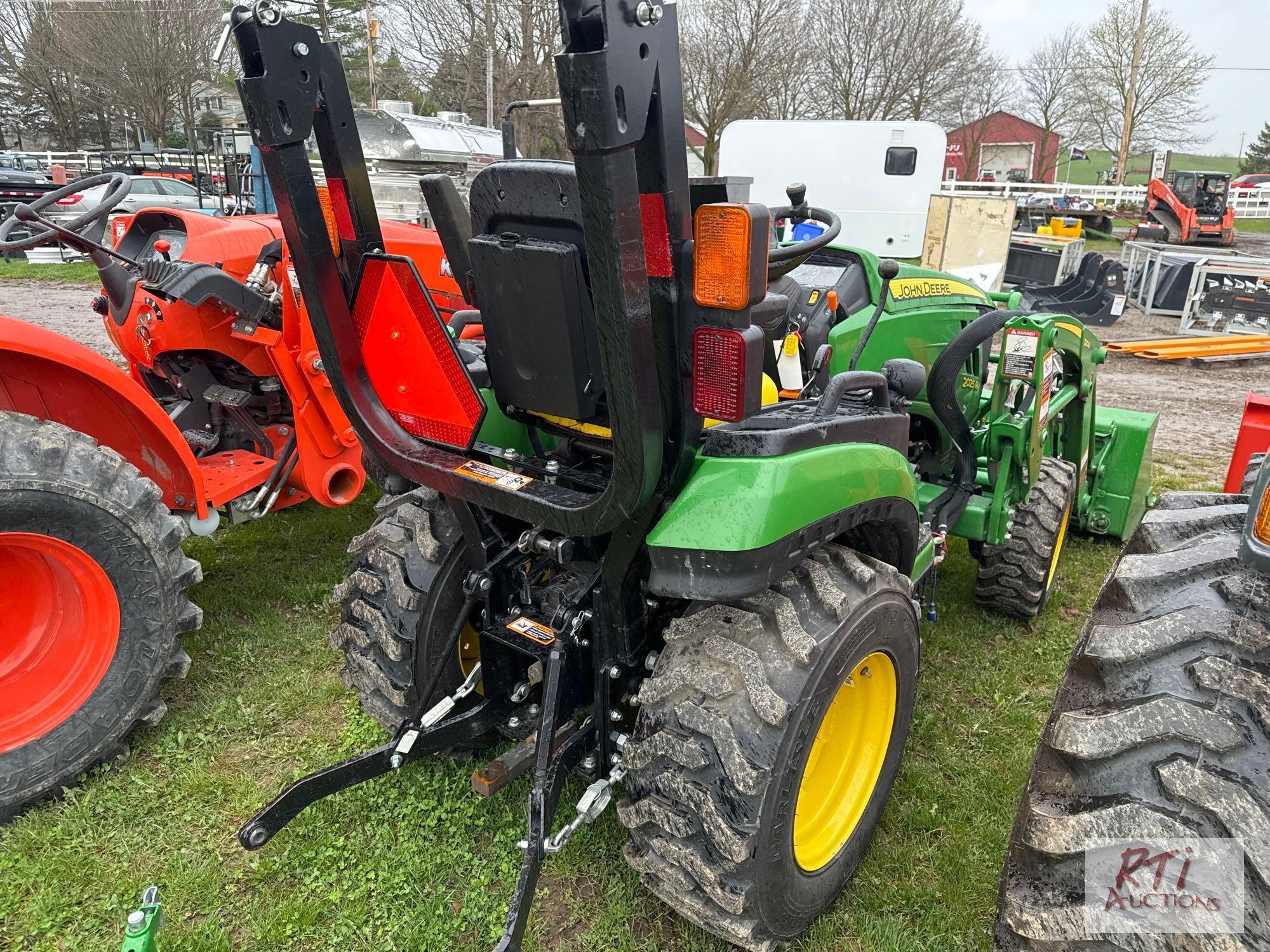 John Deere 2025R 4WD compact diesel tractor, with loader and quick attach bucket, 140hrs. Sells with