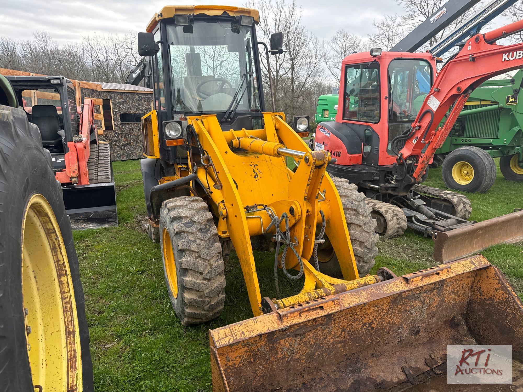 JCB 409 2X mini loader, hydraulic coupler, GP bucket, cab, heat, A/C, THU