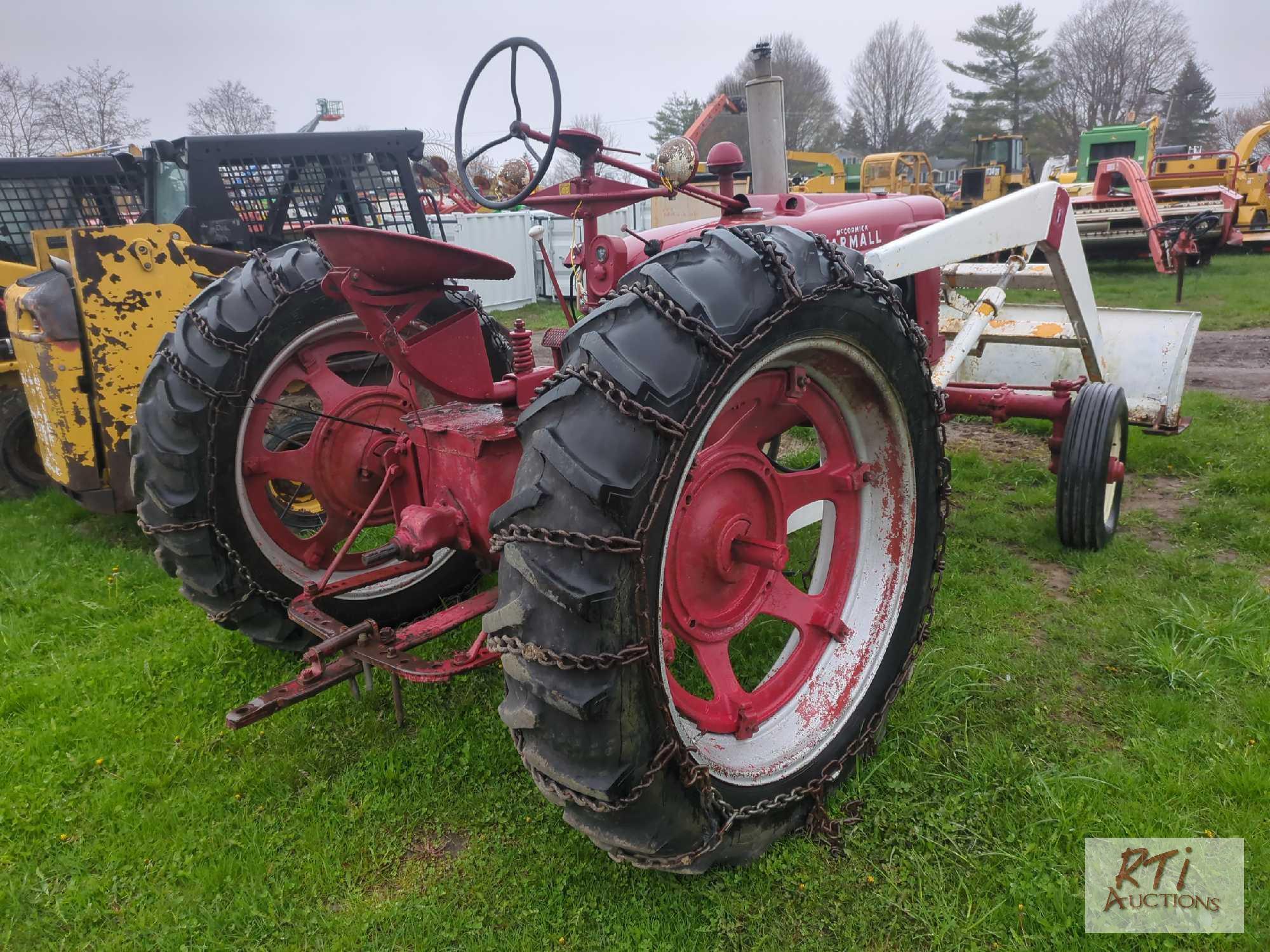 McCormick Farmall H with front blade, wide front end, draw bar, PTO