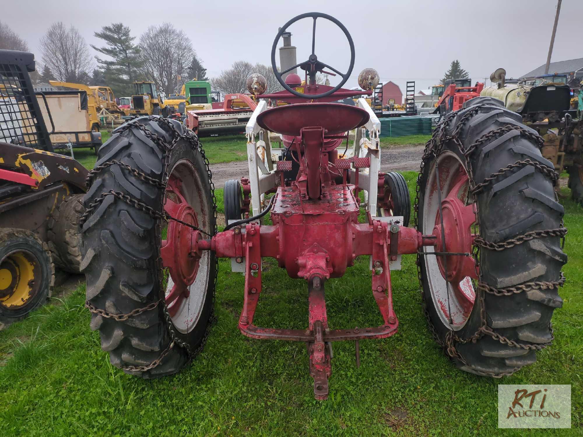 McCormick Farmall H with front blade, wide front end, draw bar, PTO