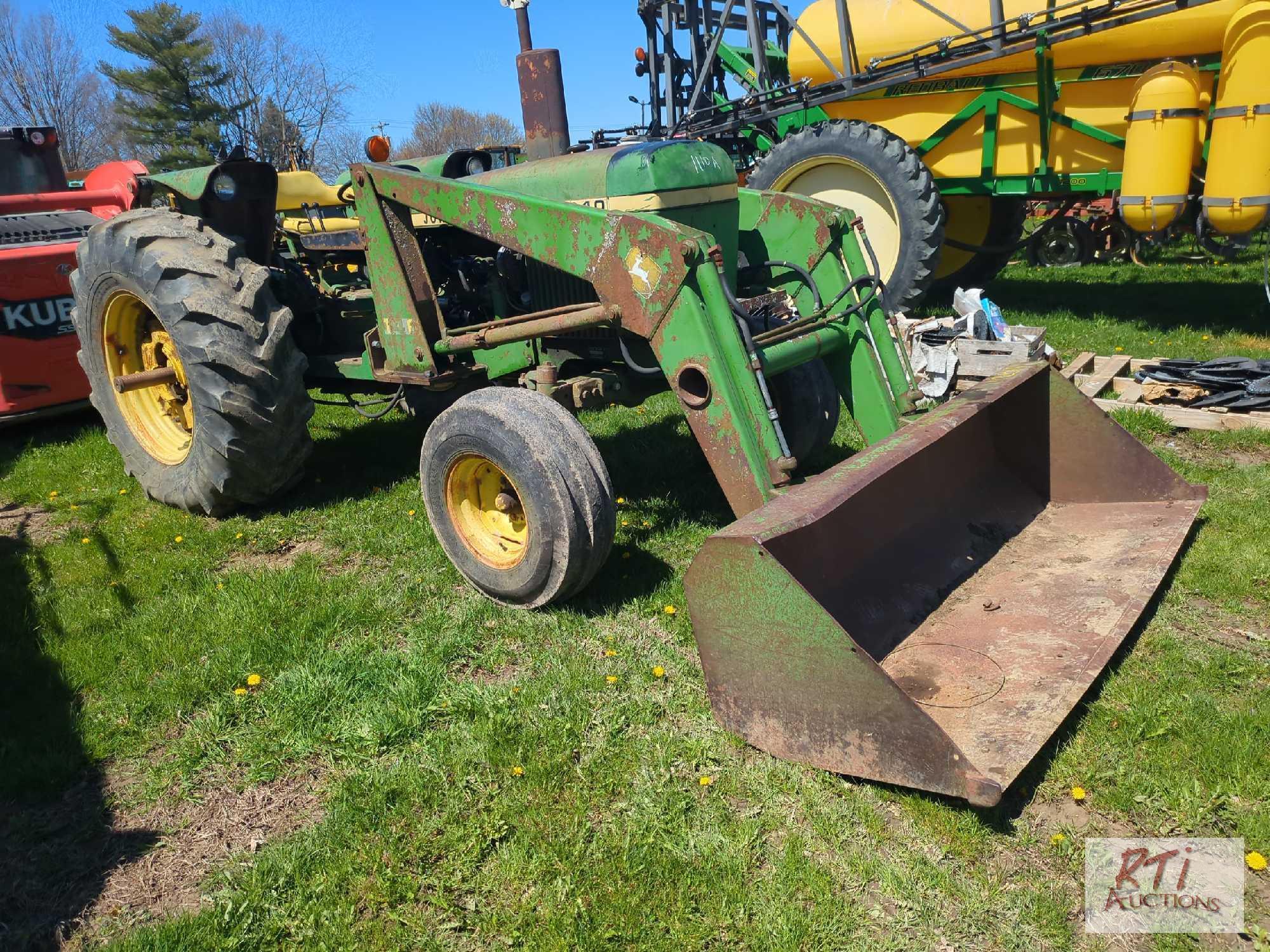 John Deere 2640 tractor with loader, rides and drives, runs okay, no 3 pt hitch