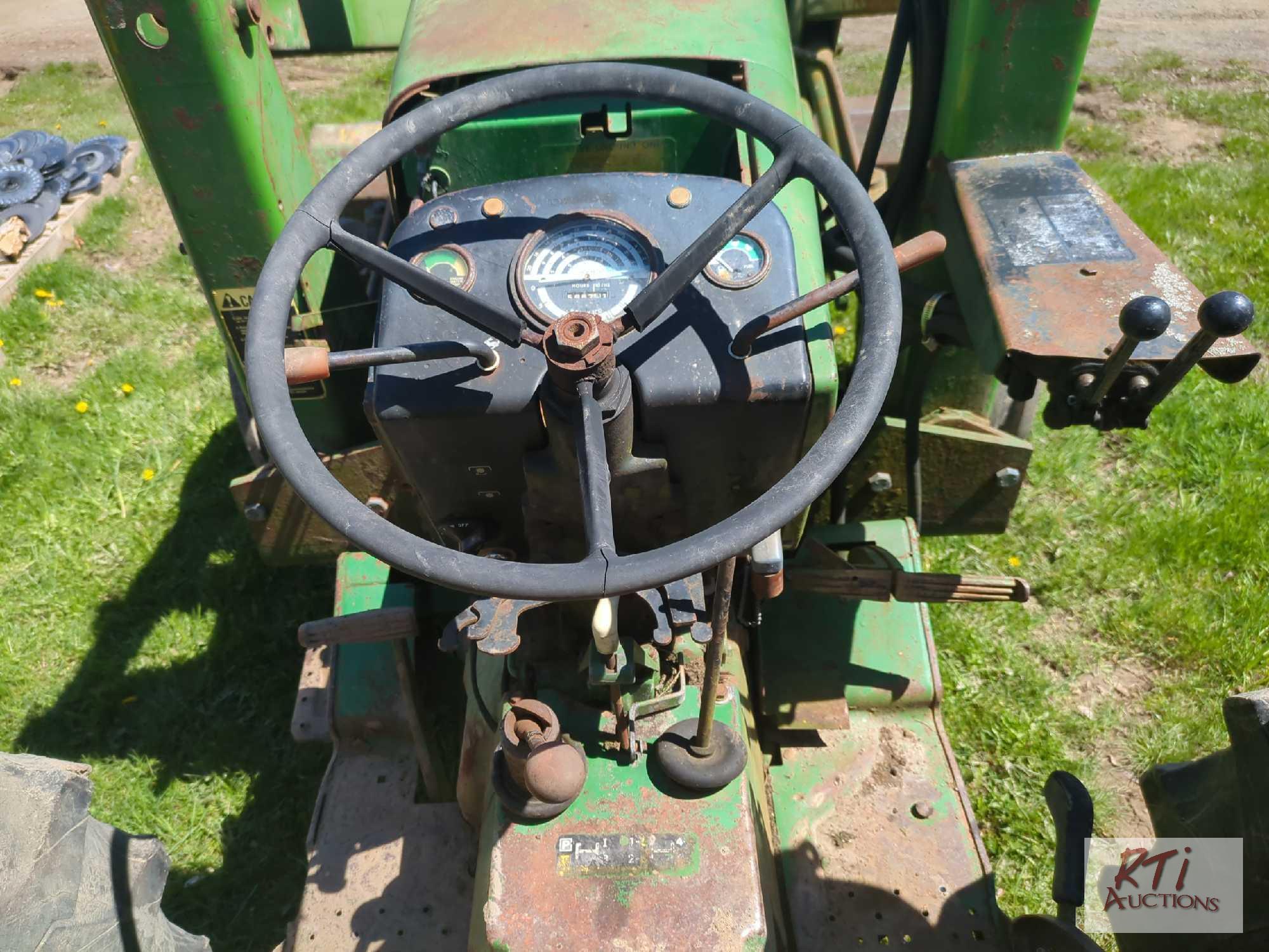 John Deere 2640 tractor with loader, rides and drives, runs okay, no 3 pt hitch