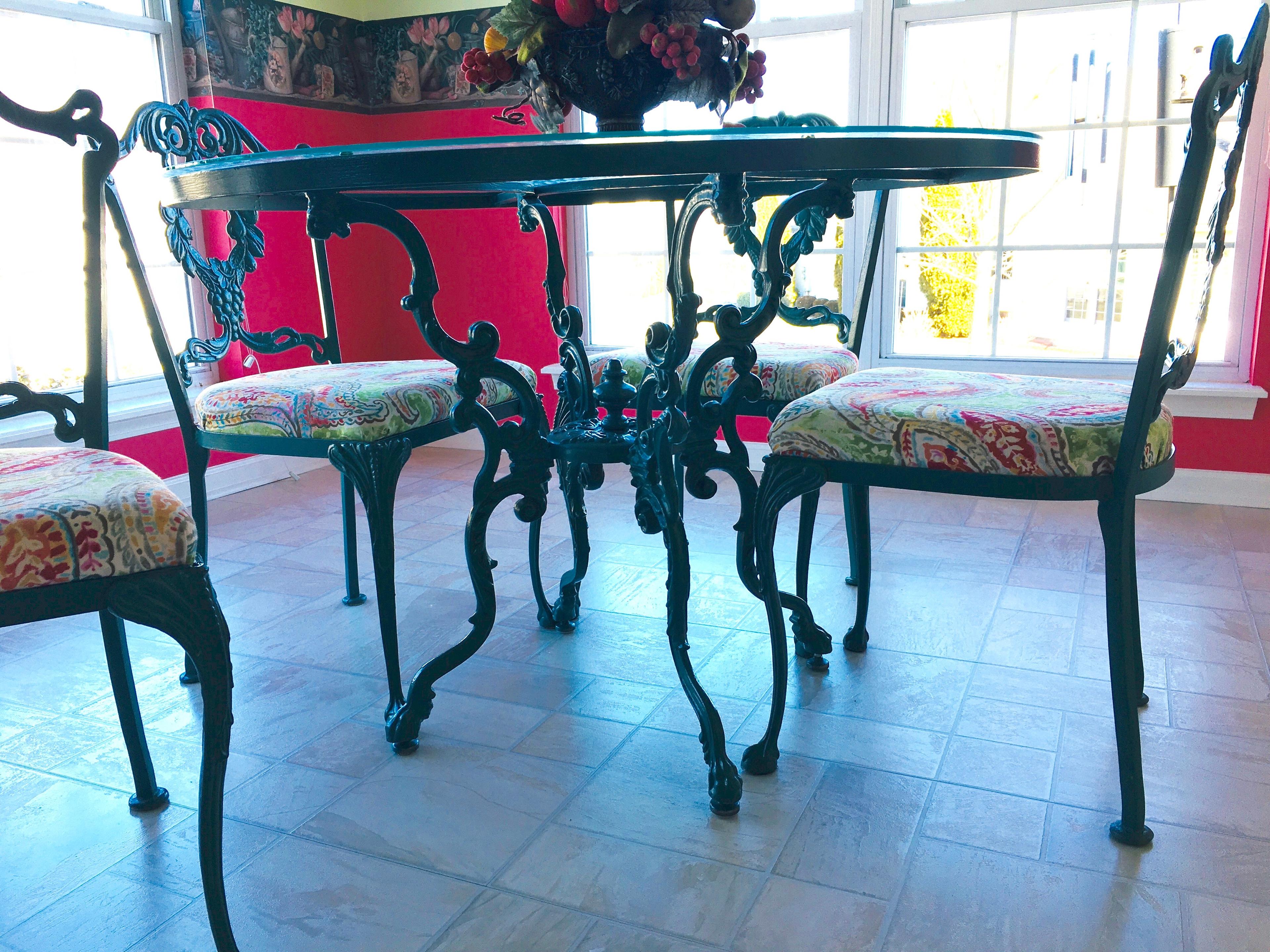 Cast Iron Table W/ Glass Top & 4 Matching Chairs