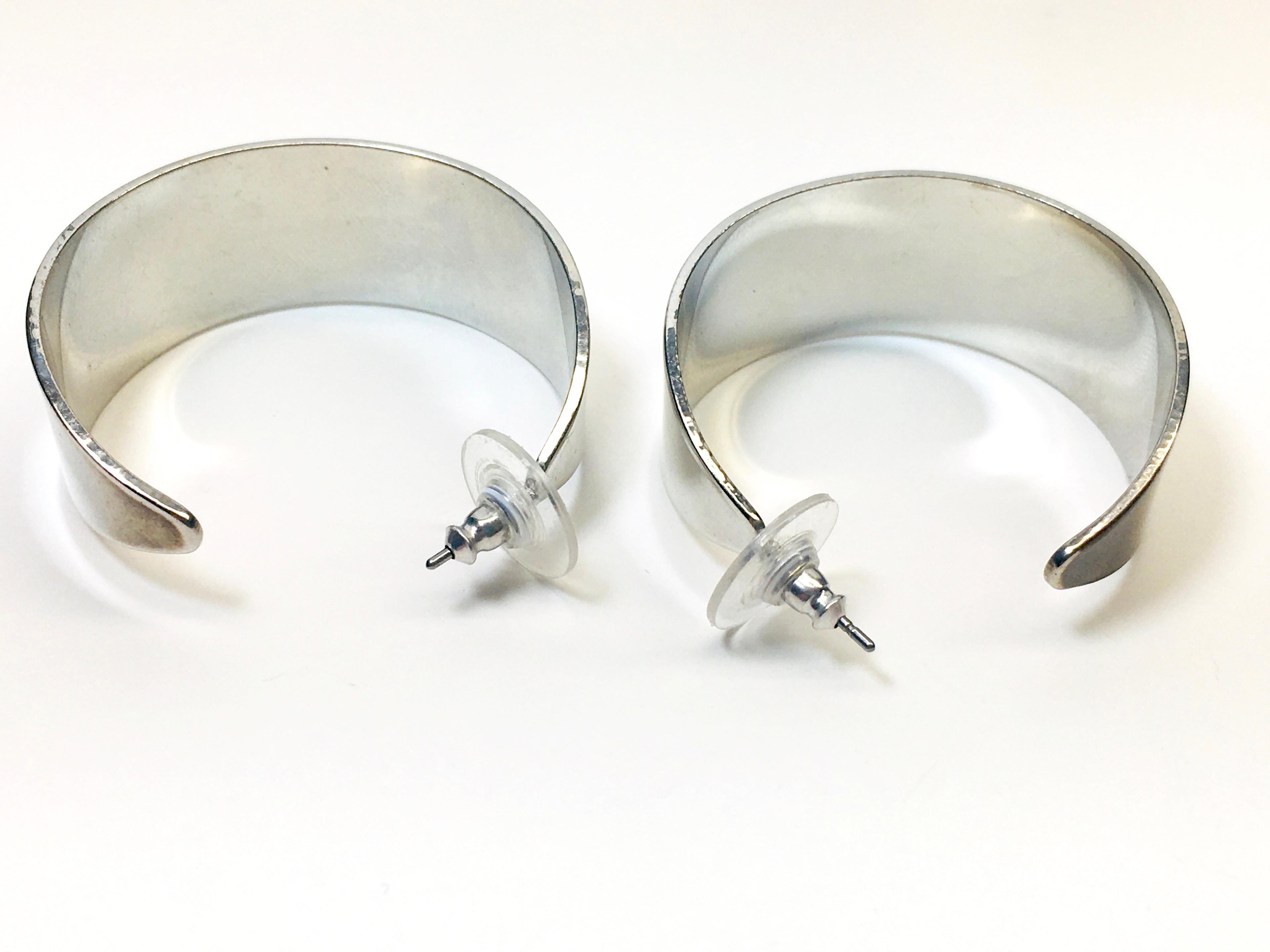 Wide Silver Tone Bracelet and Hoop Earrings