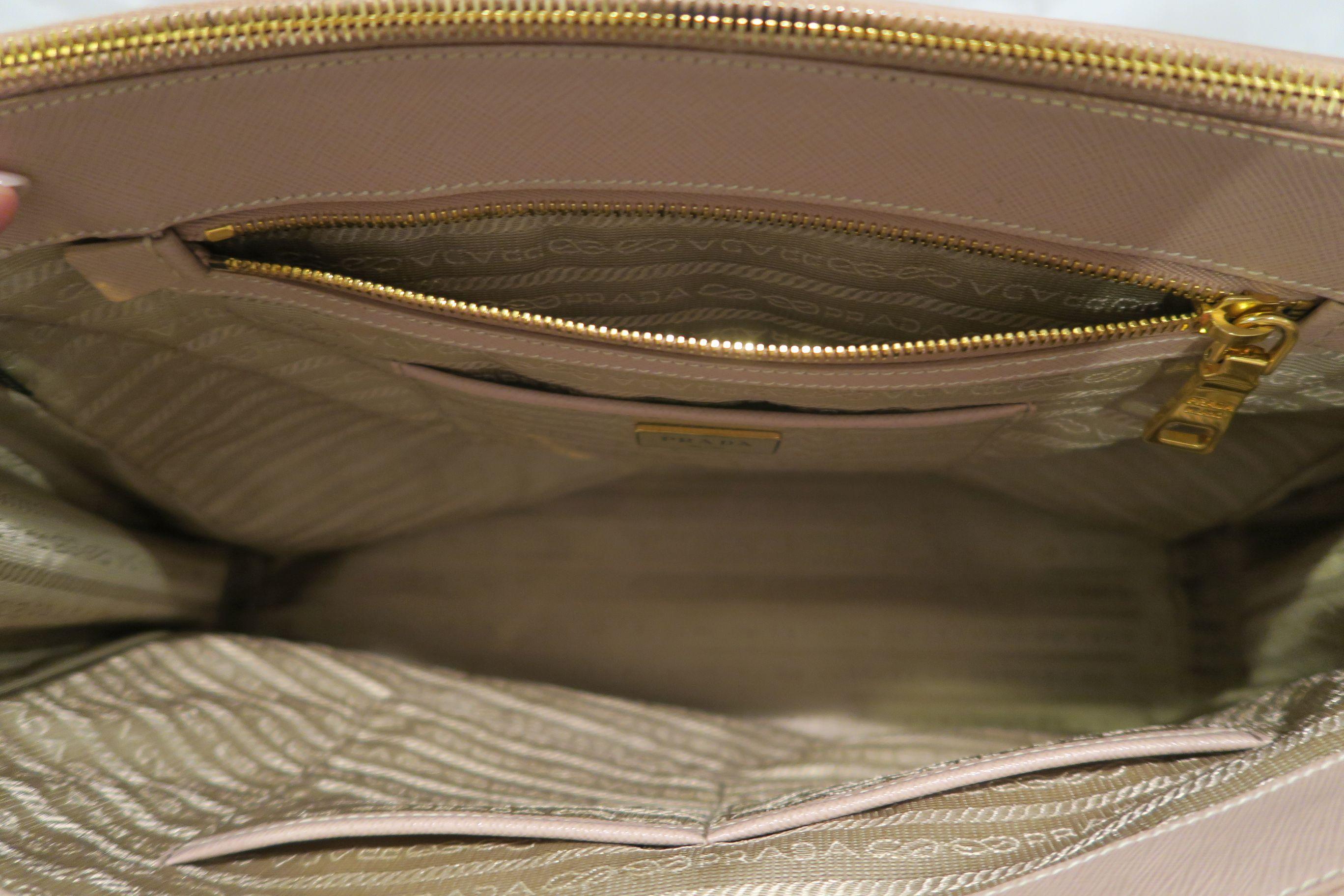 Prada Saffiano handbag, medium size bag, 13.5" x 9" x 6", three utility pockets, small zip pocket