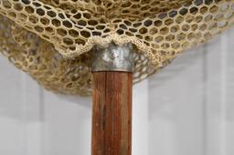 Vintage Fishing Net On Wooden Pole