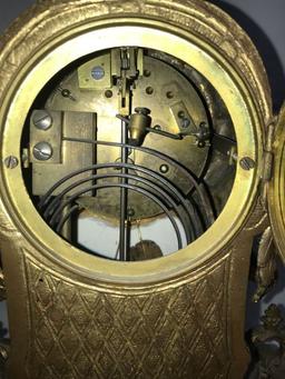 Pair of Gilt and Porcelain Candelabra & Clock.