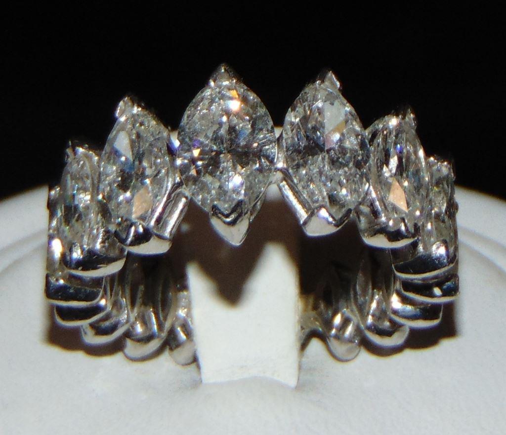 14 Kt White Gold size 4.5 Ring.