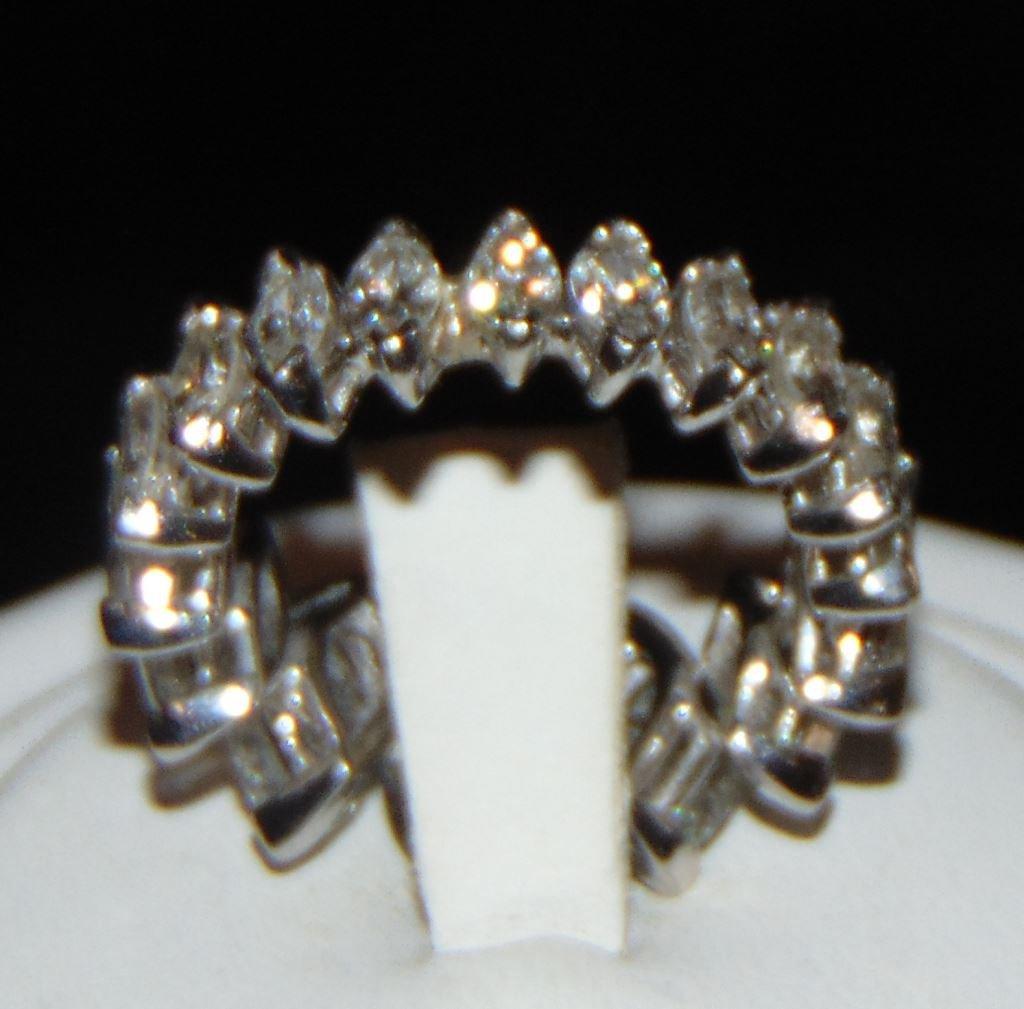 14 Kt White Gold size 4.5 Ring.