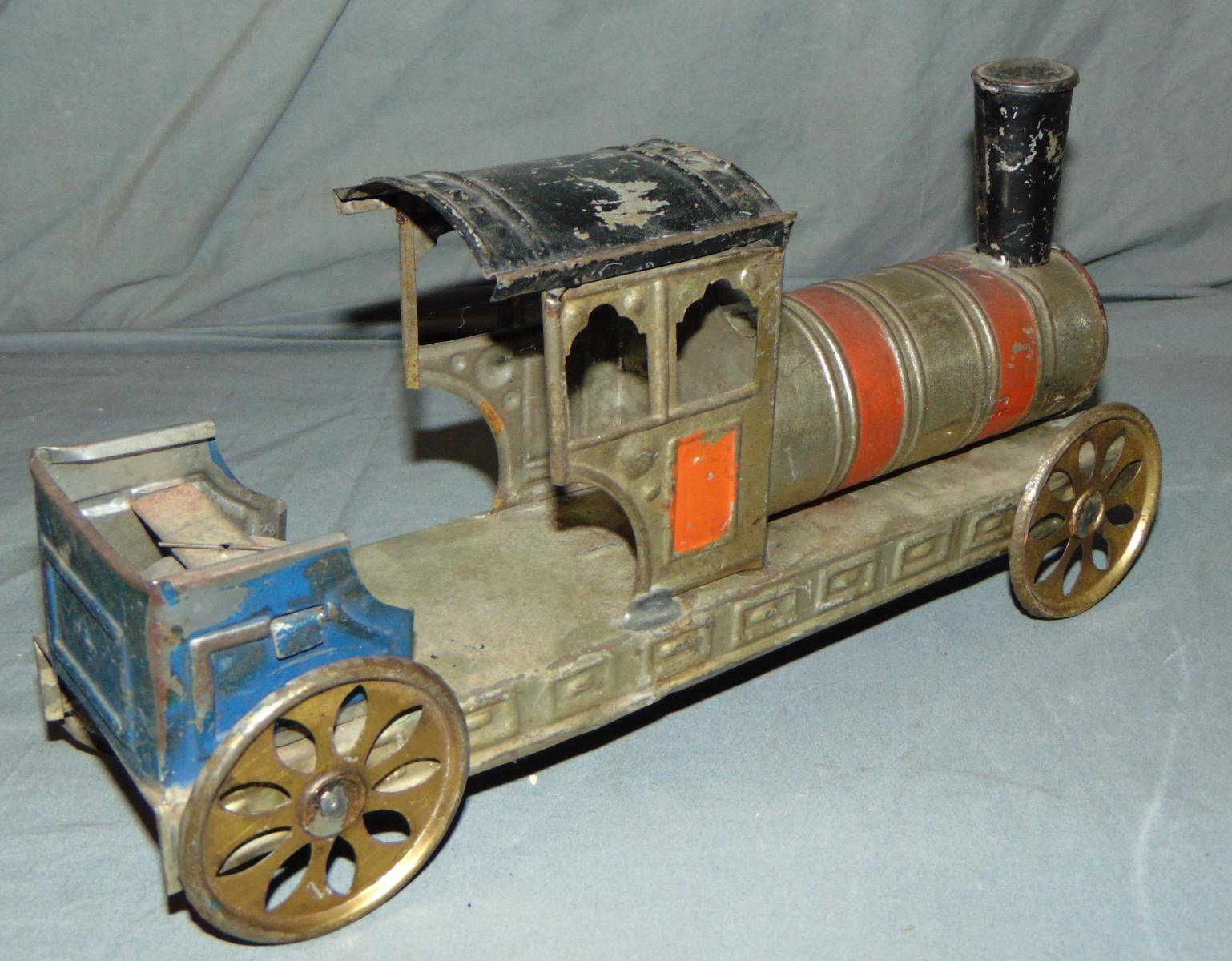 5 Tin Train Toys