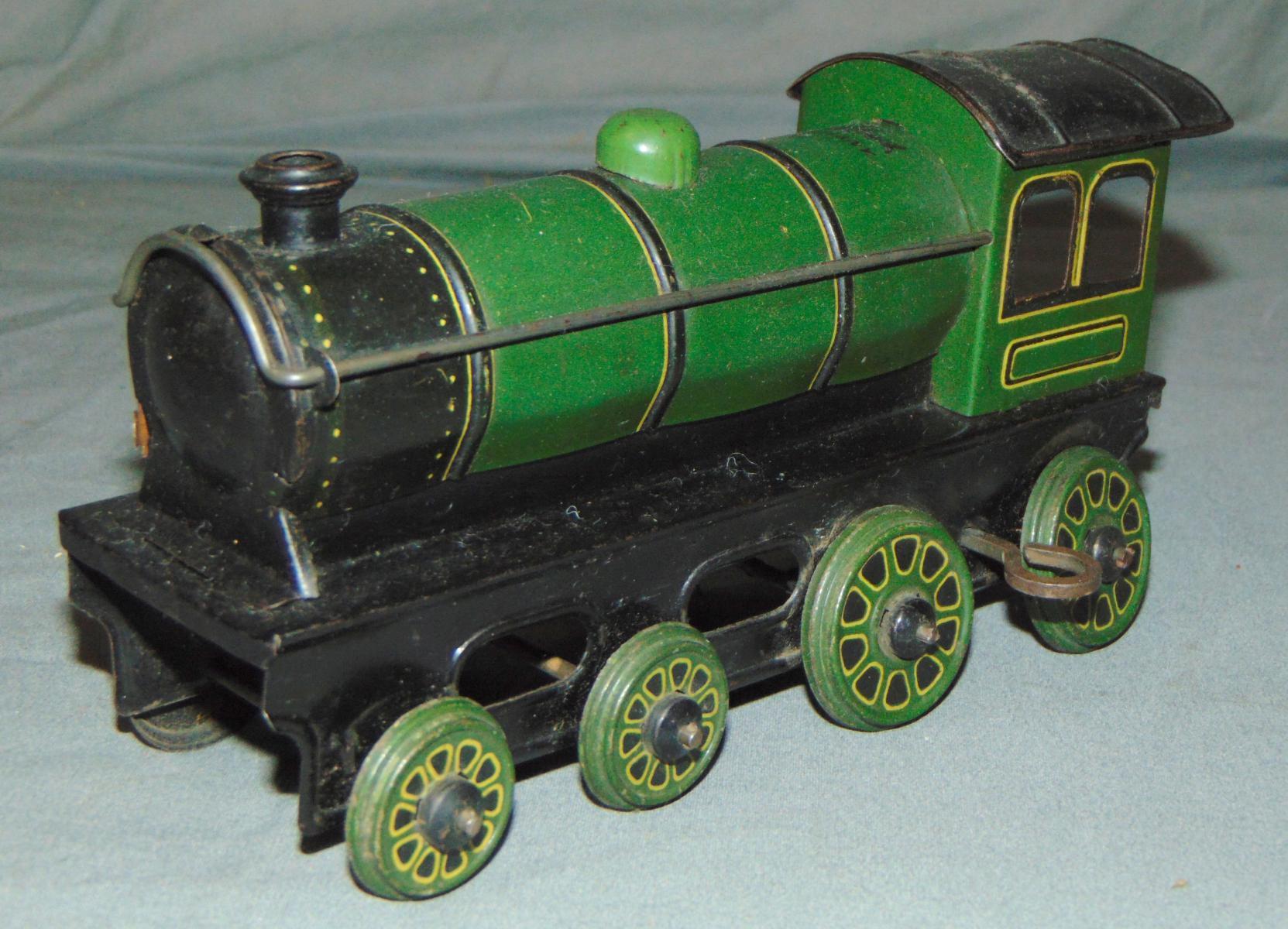 5 Tin Train Toys