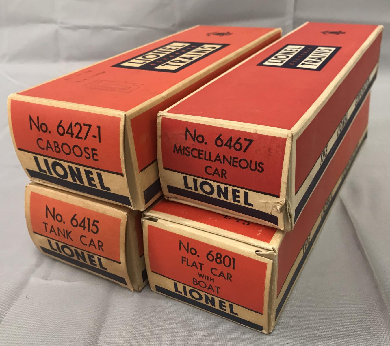 4 LN Boxed Lionel Freight Cars