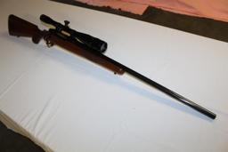 Ruger M77 Bolt Action, 220 Swift Bull Barrel w/ Redfield 24X Scope s/n 73-2