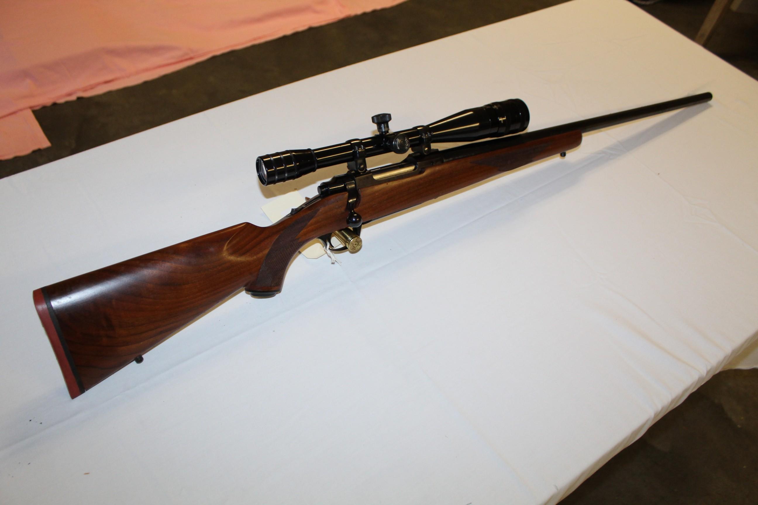 Ruger M77 Bolt Action, 220 Swift Bull Barrel w/ Redfield 24X Scope s/n 73-2