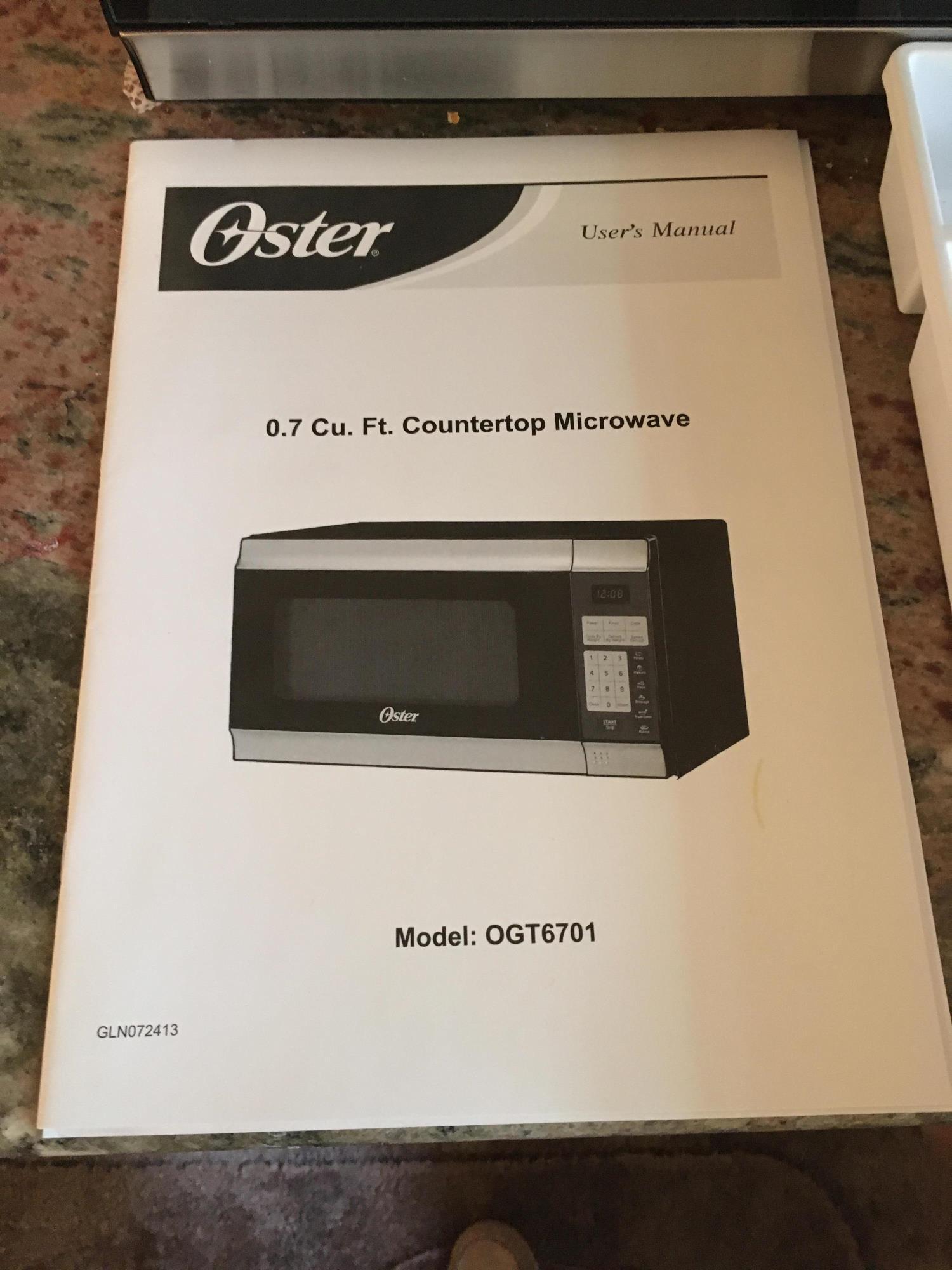 OSTER MICROWAVE WITH CAROUSEL
