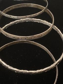 GROUP OF FIVE STERLING BRACELETS