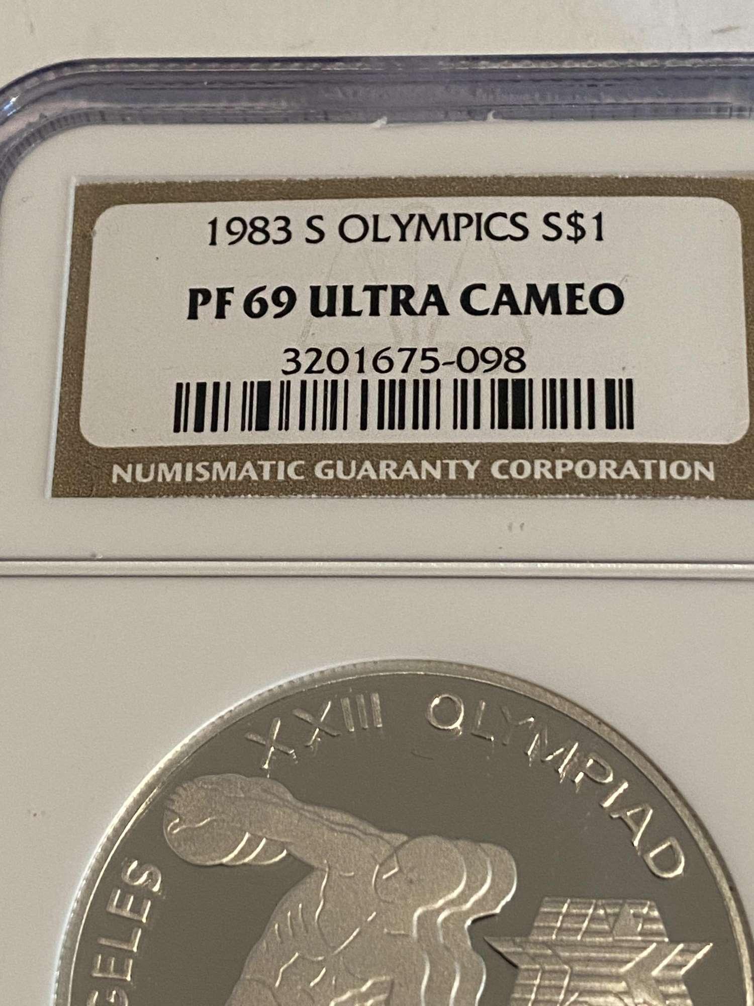 1983S OLYMPIC DOLLAR - GRADED BY NGC