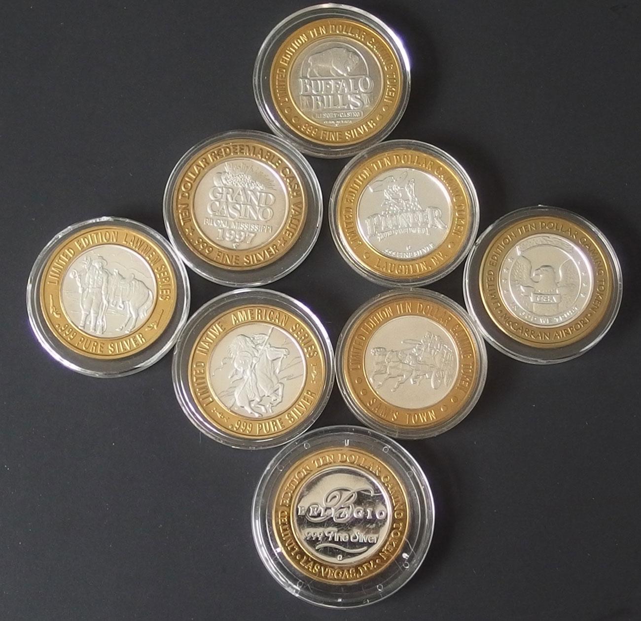 EIGHT (8) $10 .999 SILVER GAMING TOKENS