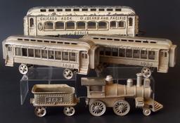 COLLECTION OF CAST IRON TOY TRAINS