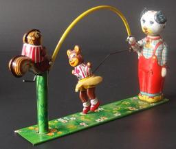 MECHANICAL SKIP ROPE ANIMALS TIN TOY