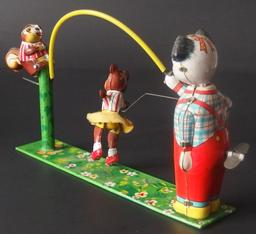 MECHANICAL SKIP ROPE ANIMALS TIN TOY