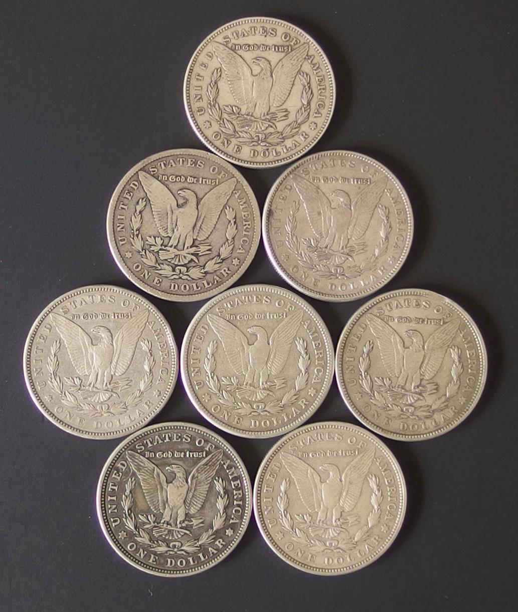 8 MORGAN SILVER DOLLAR COINS