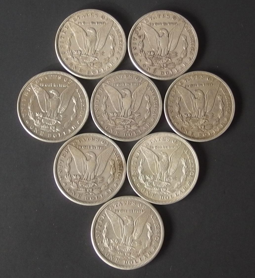 8 MORGAN SILVER DOLLAR COINS