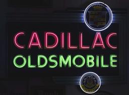 Large Cadillac & Oldsmobile Four Piece Porcelain Neon Sign w/ Dual Graphic.