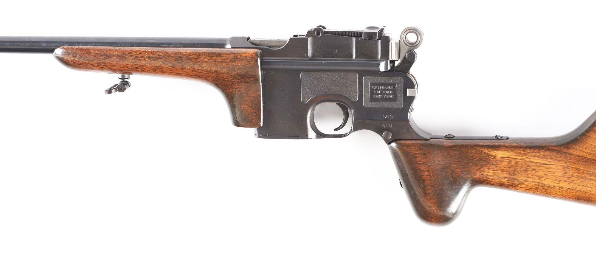 (C) Cased Mauser C96 Semi Automatic Carbine.