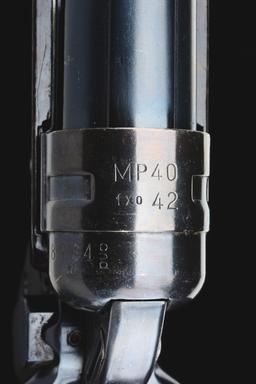 (N) ATTRACTIVE AND UNIQUE SELECT-FIRE GERMAN WORLD WAR II MP-40 MACHINE GUN (CURIO AND RELIC).