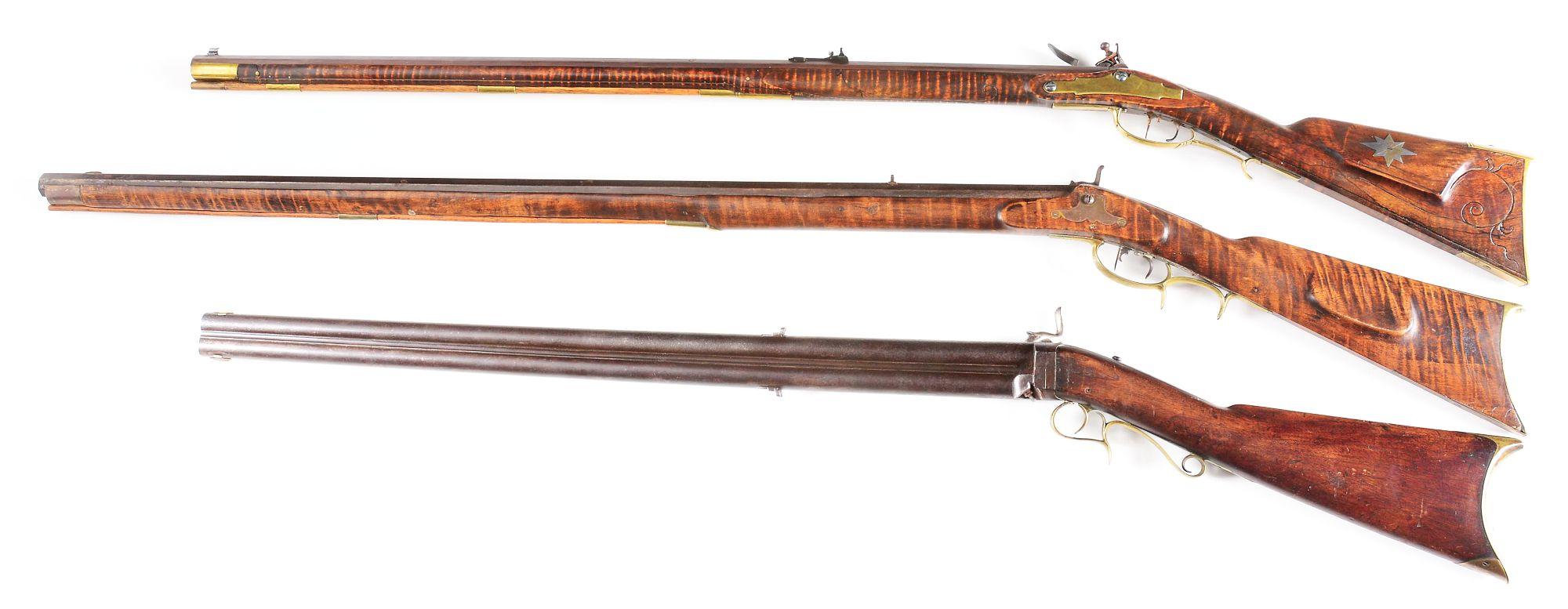 (A) LOT OF THREE: THREE MUZZLELOADING RIFLES.