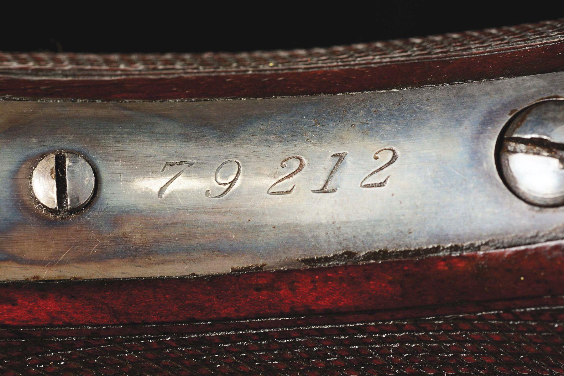 (A) DELUXE WINCHESTER MODEL 1886 LEVER-ACTION RIFLE WITH RARE 30-INCH MATTED BARREL.