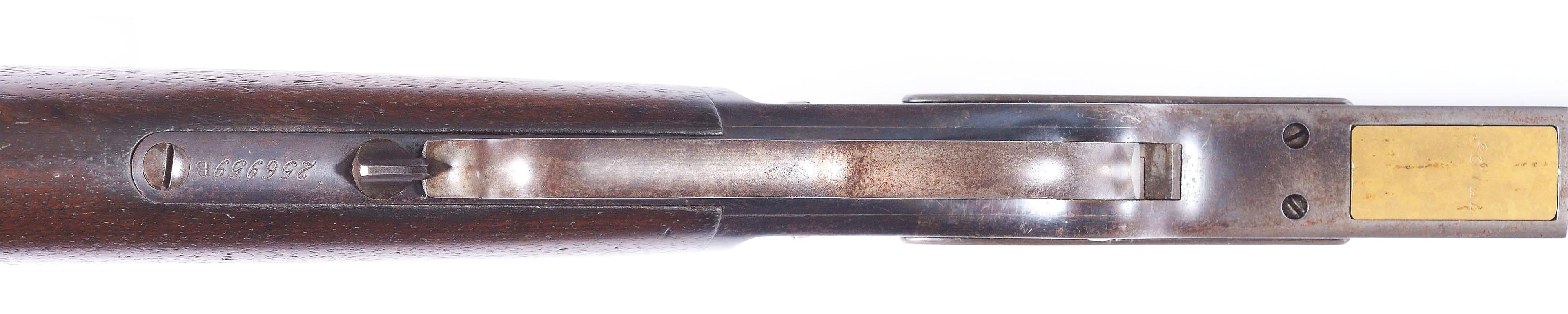 (A) WINCHESTER MODEL 1873 LEVER ACTION RIFLE.