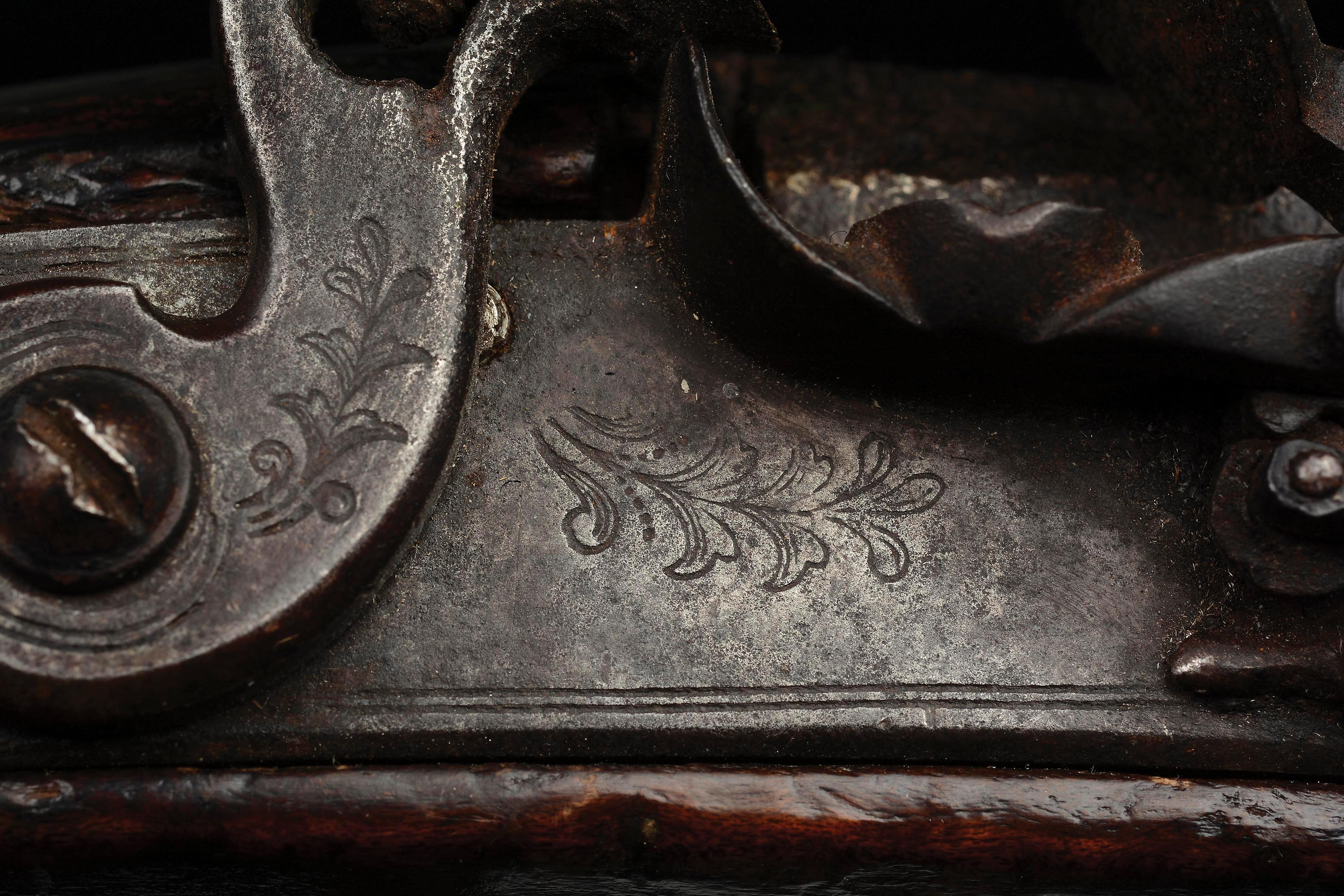 (A) Carved Berks County Flintlock Rifle Attributed to Adam Angstadt.