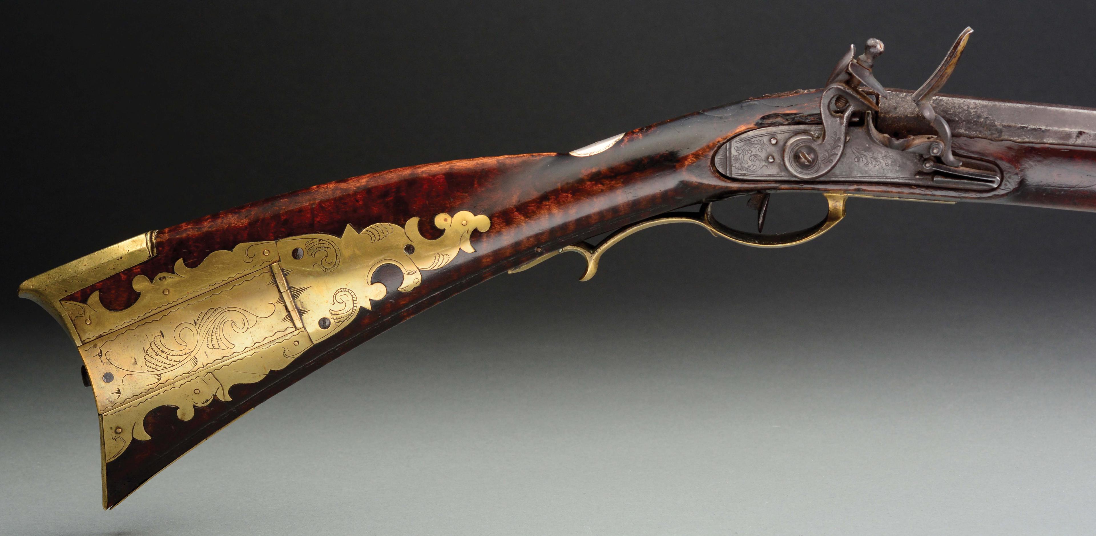 (A) Carved Berks County Flintlock Rifle Attributed to Adam Angstadt.