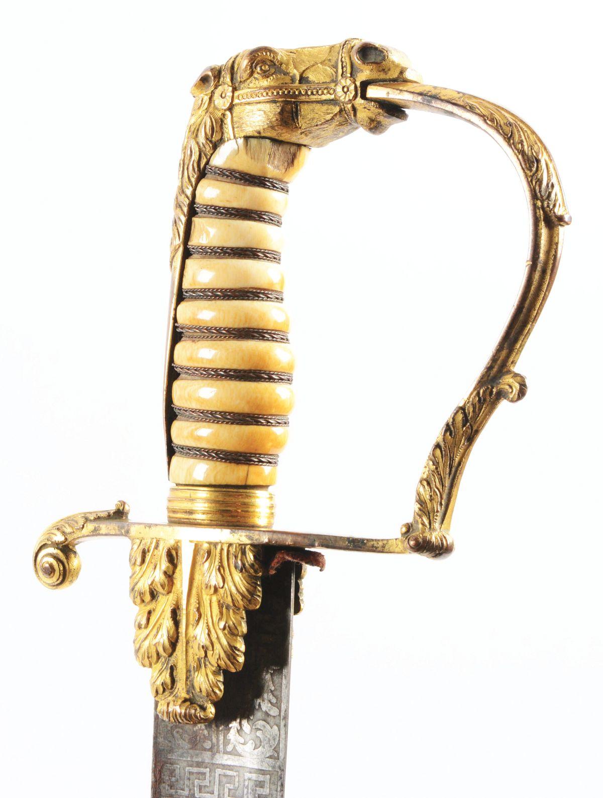 ELABORATE GILT BRASS HORSE HEAD POMMEL OFFICER'S SABER WITH SCABBARD.