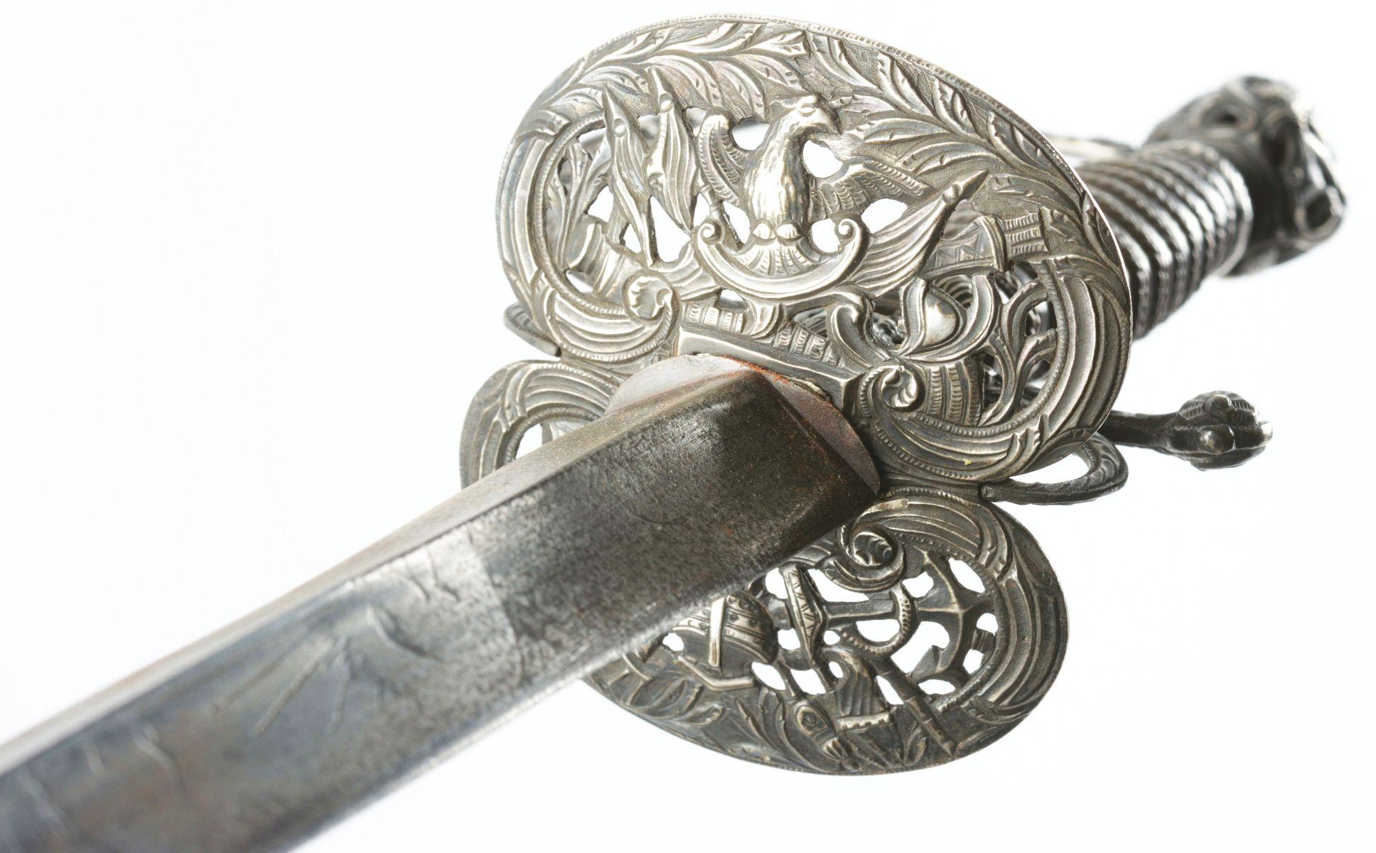 FINE SILVER-HILTED SMALL SWORD DECORATED WITH NAVAL MILITARY MOTIFS.