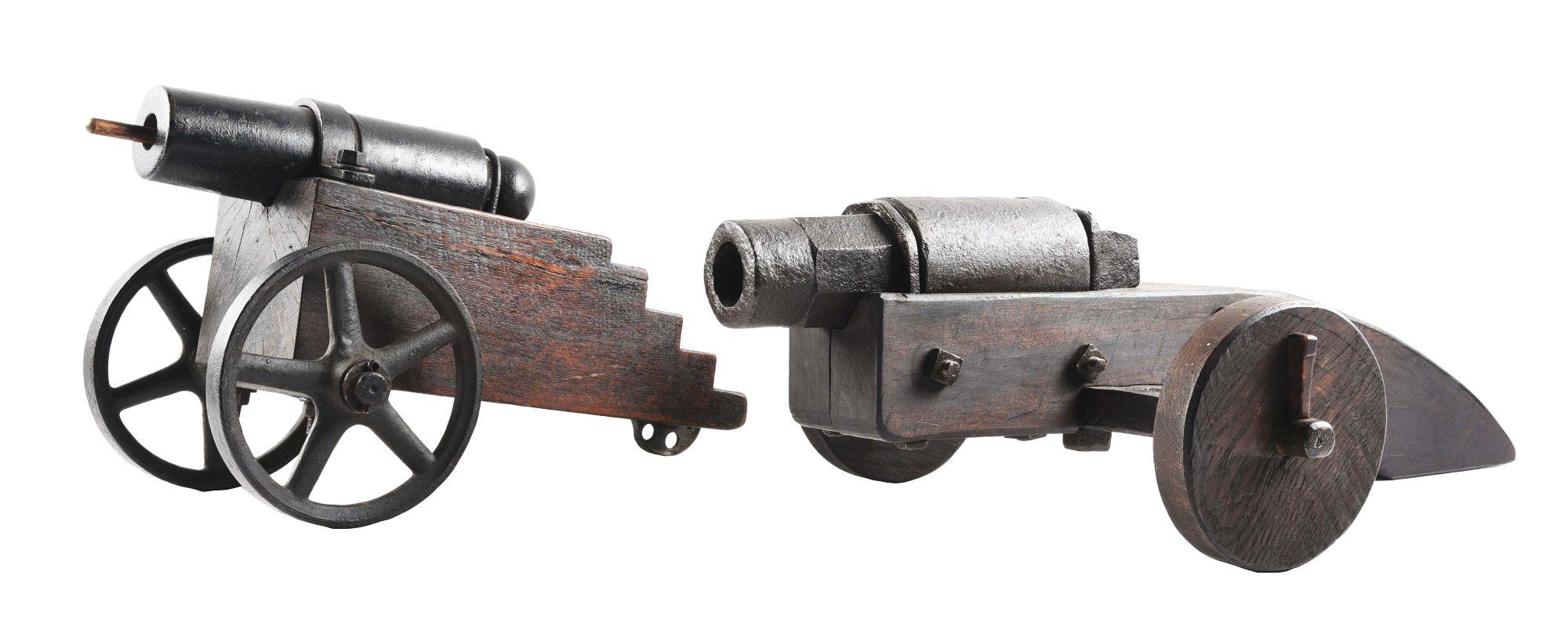 LOT OF 2: IRON CANNONS ON WOOD CARRIAGES.