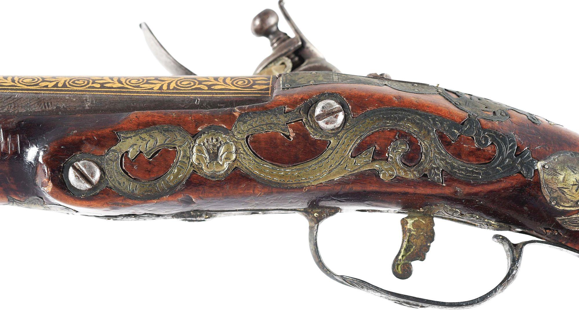 (A) PROFUSELY DECORATED MIDDLE EASTERN FLINTLOCK PISTOL, PROBABLY BALKAN.