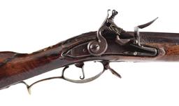 (A) EARLY CARVED FLINTLOCK KENTUCKY RIFLE.