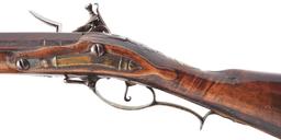 (A) EARLY CARVED FLINTLOCK KENTUCKY RIFLE.