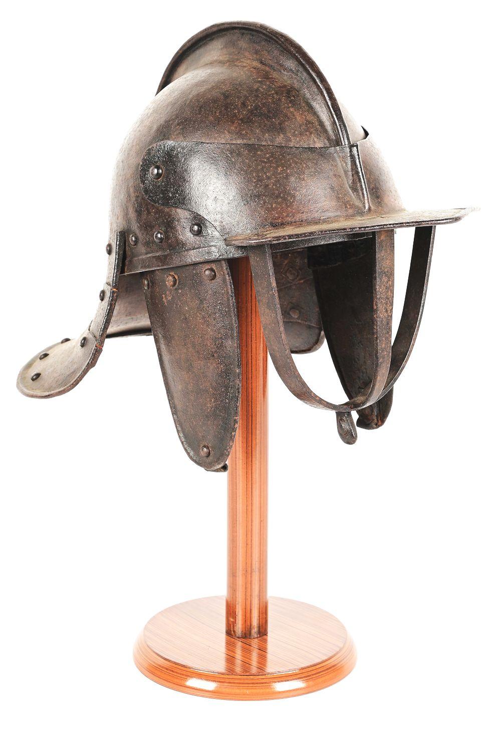 17TH CENTURY LOBSTER TAIL POT HELMET WITH STAND.