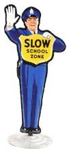 COCA-COLA SLOW SCHOOL ZONE TRAFFIC OFFICER EMBOSSED TIN SIGN W/ COCA COLA BASE.