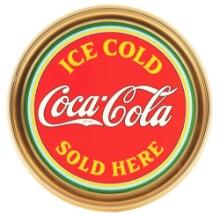 ICE COLD COCA-COLA SOLD HERE EMBOSSED TIN SIGN W/ ORNATE WOODEN FRAME.