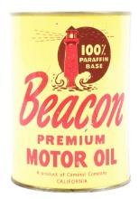 BEACON PREMIUM MOTOR OIL ONE QUART CAN W/ LIGHTHOUSE GRAPHIC.