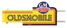 OLDSMOBILE GM HYDRA-MATIC DRIVE PORCELAIN NEON SIGN W/ GM ATTACHMENT SIGNS.