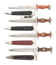 LOT OF 4: THIRD REICH SA AND NSKK DAGGERS.