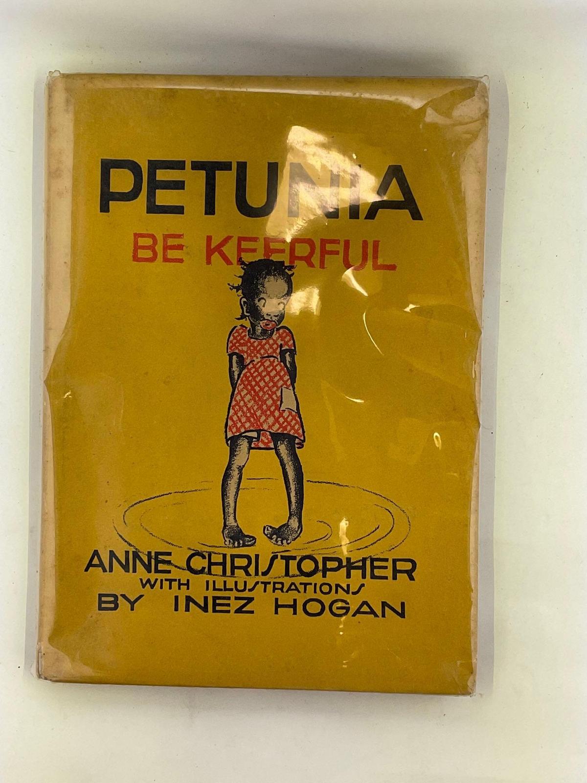 "Petunia Be Keerfull" By Anne Christopher in clear out jacket