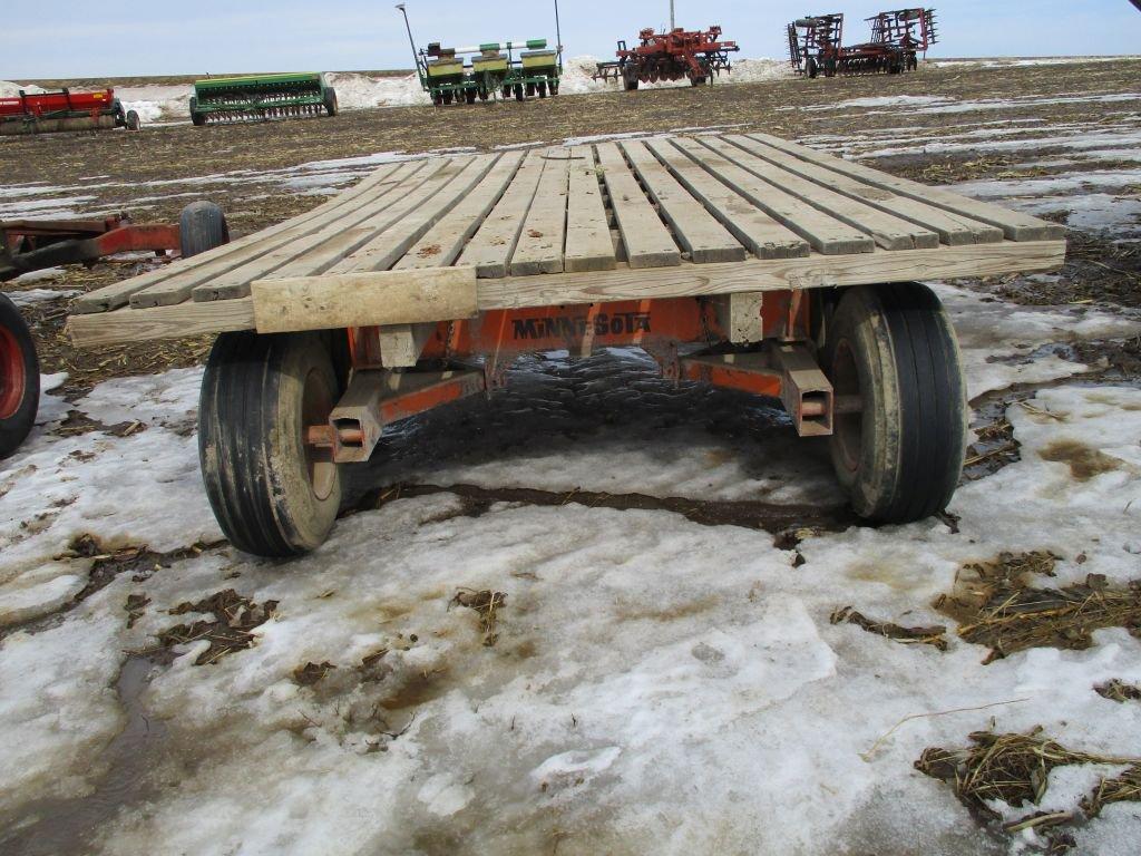 9' x 16' Wooden flat wagon w/MN 12 ton tandem gear